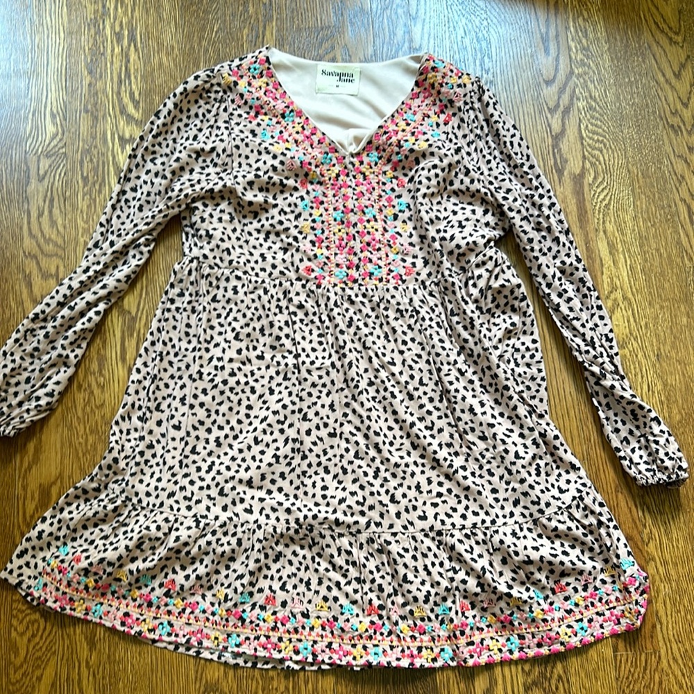Stunning leopard print long sleeve dress with embroidery on top and bottom!